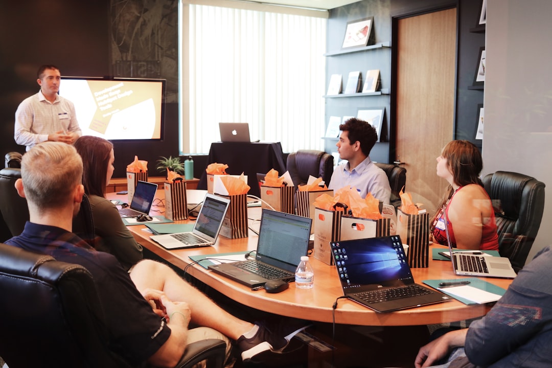 Business team evaluating manufacturing partner requirements